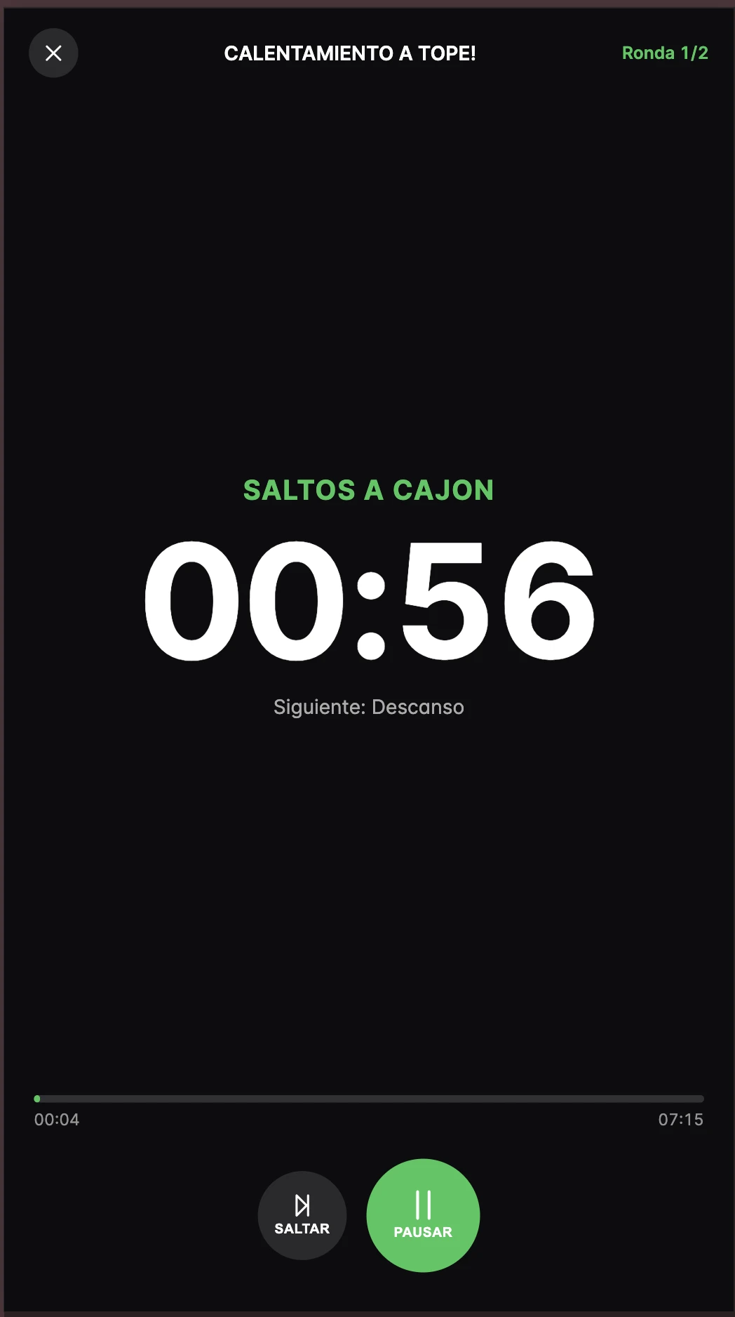 Player de circuito a pantalla completa en fase de trabajo: ejercicio Saltos a cajón, cuenta atrás grande, ronda 1 de 2, progreso y controles de saltar y pausar